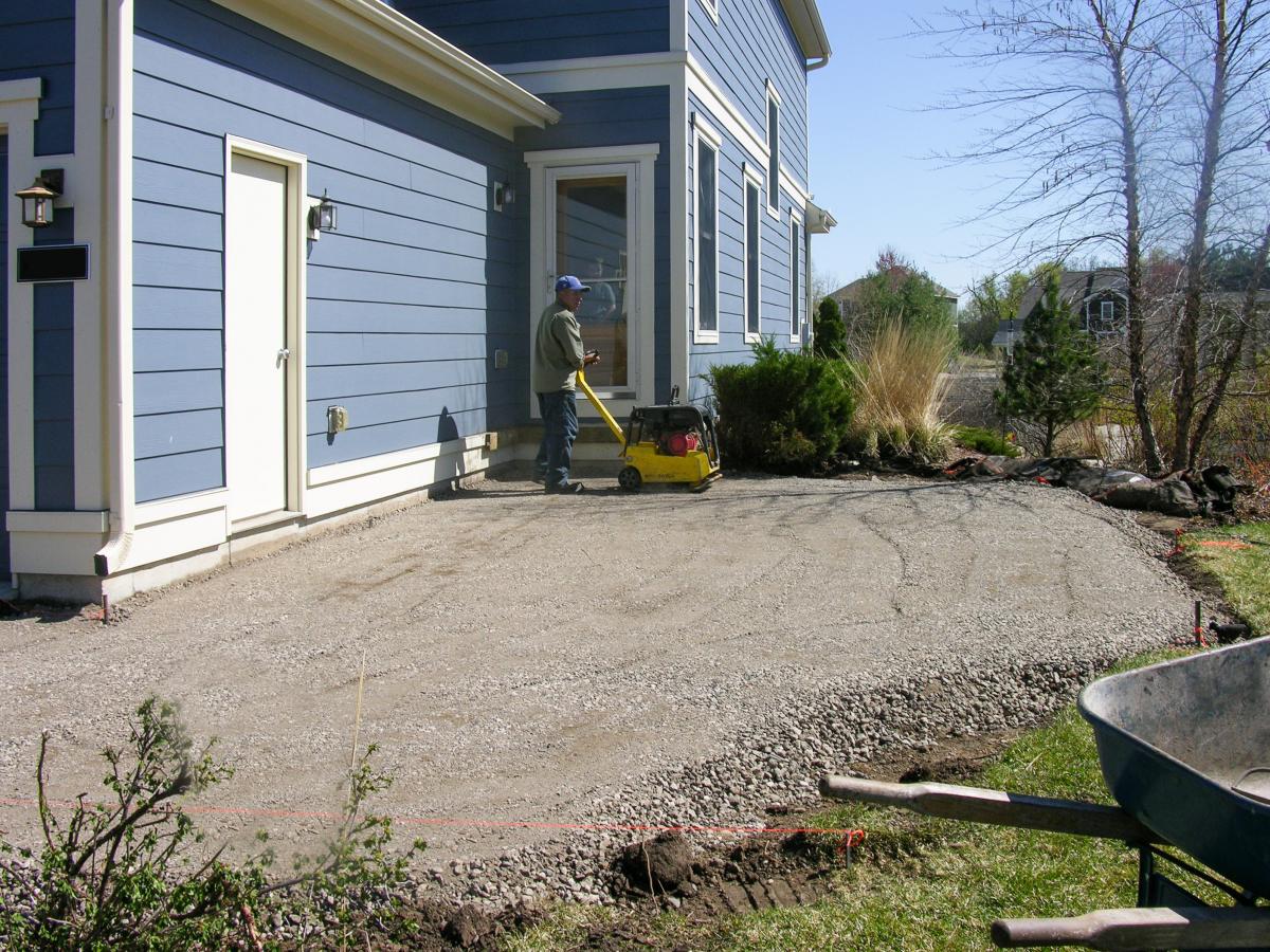 The old hardscapes have been removed and the foundation laid for the new entryway.