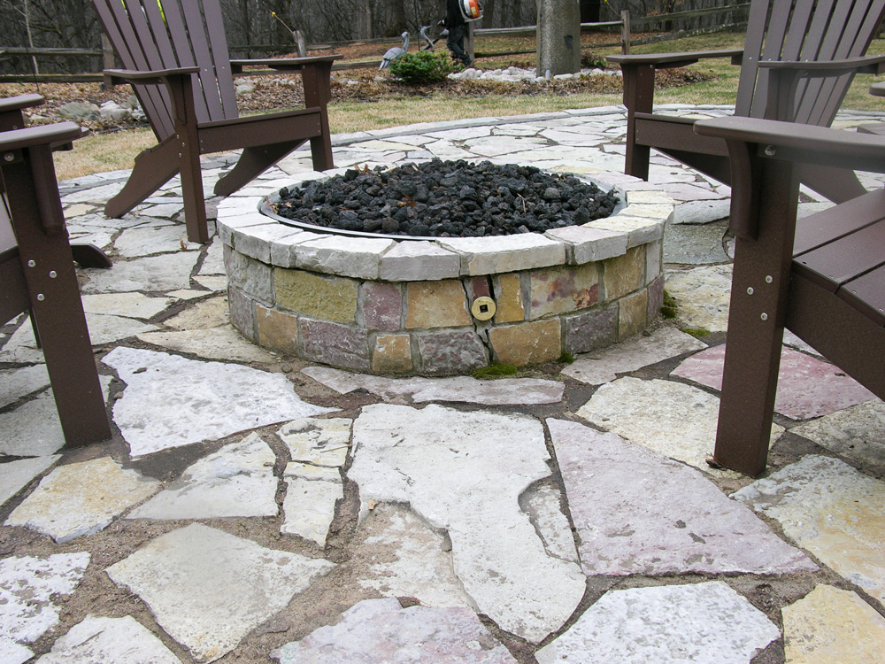 The cracked fire pit before replacement